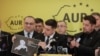 Claudiu Tarziu și Cristian Terhes îl încadrează pe liderul AUR George Simion, la prezentarea candidaților partidului la Parlamentul European