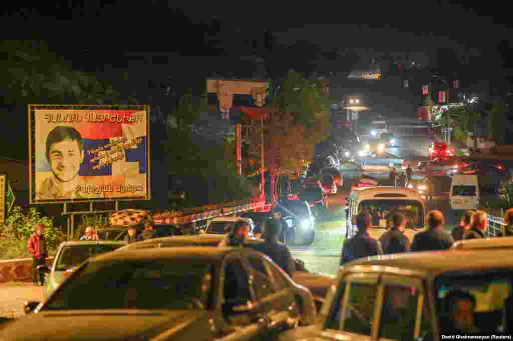 This was the scene late on September 24 as ethnic Armenians prepared to flee Nagorno-Karabakh past a billboard featuring the Russian flag, and Vladimir Putin. The photo was taken in the city known as Stepanakert in Armenian, and Xankendi in Azeri. 