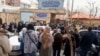 Families protest in Tehran on March 5.