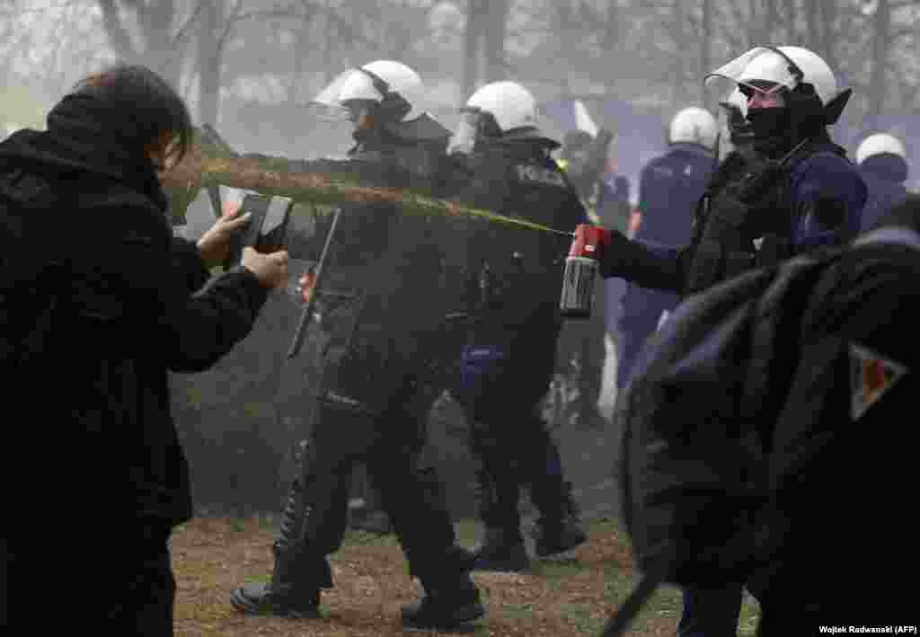 Police in Poland deploy pepper spray on protesters. Piotr Duda, the chairman of Poland's Solidarnosc, a trade union that began as an anti-communist movement told protesters in Warsaw that the EU "want to take away what we have won with hard work just because European leftists thought they would protect the planet." 