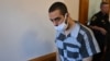Hadi Matar, the man accused in the attempted murder of British author Salman Rushdie, leaves court after a procedural hearing at Chautauqua County Courthouse in Mayville, New York, on August 18.