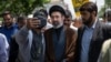 Mojtaba Khamenei (center) is the son of Ali Khamenei, Iran's supreme leader.
