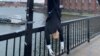 A puppet of Turkish President Recep Tayyip Erdogan is hung by its feet during a demonstration in Stockholm on January 12.