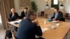 Serbian President Aleksandar Vucic (foreground) and Kosovar Prime Minister Albin Kurti (right) meet in Brussels on November 21.