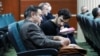 Iranian actor Hossein Mohammadi, pictured in court on December 15, was charged with killing Basij militia member Ruhollah Ajamian and sentenced to death in a revolutionary court.