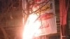 Videos and images on social media have shown protesters setting fire to government banners marking the anniversary.