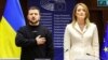 Ukrainian President Volodymyr Zelenskiy poses next to European Parliament President Roberta Metsola after arriving for a summit in Brussels on February 9.