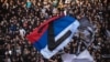 Partizan supporters wave a Serbian flag with the letter Z -- a symbol of support for Russian military action in Ukraine -- during a match in Belgrade in April.