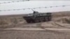На видео, которое как сообщается было снято за три или четыре дня до столкновений 3 января между боевиками Талибана и туркменскими пограничниками на туркмено-афганской границе, видна военная техника на туркменской стороне границы. 