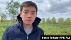 Alimzhan Izbasarov talks to a reporter shortly after he was drafte, in Nur-Sultan on May 23, 2019.