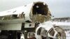 Розрізаний стратегічний бомбардувальник Ту-160 на військовому аеродромі, 2 лютого 2001 року. Літак знищено в рамках відмови України від ядерної зброї, що було обумовлено Будапештським меморандумом, підписаним у 1994 році. Згідно із цим Меморандумом США, Росія і Велика Британія зобов'язалися, поважати незалежність, суверенітет та існуючі кордони України
