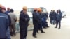 Рабочие нефтесервисной компании Techno Trading LTD во время акции протеста в обеденный перерыв. Мангистауская область, 4 марта 2016 года.
