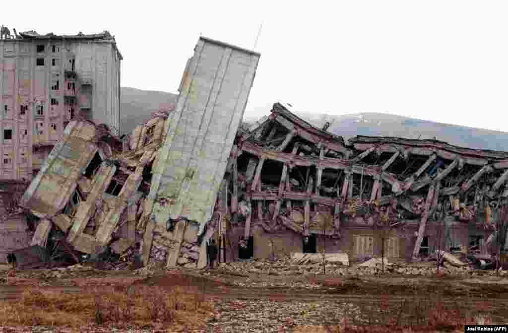 Many of the region&#39;s buildings cracked at their base, leading to some structures toppling like felled trees.
