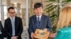 Kazakh President Qasym-Zhomart Toqaev has appointed his brother-in-law Temirtai Izbastin (center) as ambassador to Bulgaria. 