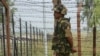An Indian soldier stands guard near the Line of Control in Kashmir. (file photo)