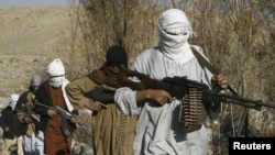 Well-armed Taliban fighters at an undisclosed location in Nangarhar Province on December 13