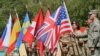 NATO Takes Command Of Afghan Security