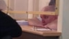 Лидер оппозиционной партии "Алга" Владимир Козлов на скамье подсудимых. Актау, 16 августа 2012 года. 