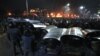 Armenian demonstrators clash with police during a mass protest outside the Russian consulate in Gyumri on January 15. 