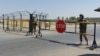 Uzbek soldiers guard a checkpoint over the Amu Darya River, which separates Uzbekistan and Afghanistan, near Termez. (file photo)