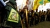 Experts say Kataib Hizballah is one of the most powerful groups in the umbrella alliance of hard-line Shi'ite militias in Iraq backed by Tehran.
