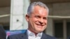 Democratic Party leader Vladimir Plahotniuc delivers a speech to supporters at a rally to support his candidacy for prime minister in Chisinau in January 2016.