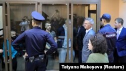 Ukrainian sailors who were seized by Russian forces in November 2018 attend a court hearing in Moscow on August 16.