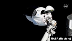 The SpaceX Crew Dragon capsule approaches the International Space Station on March 3. 
