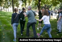 Kravchenko told RFE/RL that Garanich led the boy "to a safe distance from where he was able to leave" without being attacked further.