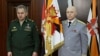 Игорь Коробов, руководитель главного управления Генштаба России (справа), и министр обороны России Сергей Шойгу. Москва, 2 февраля 2016 года.