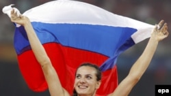 Ruska atletičarka Jelena Išinbajeva posle pobede u skoku s motkom na Olimpijskim igrama u Pekingu, 18. avgust 2008.