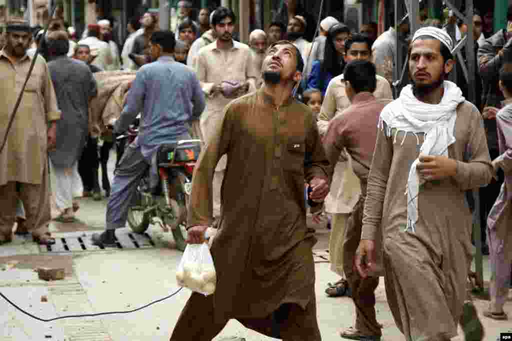 People in Peshawar react to the quake.