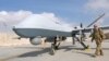Америкалык аскер MQ-9 Reaper учкучсуз аппаратынын жанында турат. Ооганстан, Кандагар авиа базасы. 23-январь, 2018-жыл.