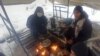 Migrants Exposed To Heavy Snow In Burned-Out Bosnian Tent Camp