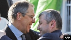 South Ossetian President Eduard Kokoity (right) embraces Russian Foreign Minister Sergei Lavrov in Tskhinvali on September 15.