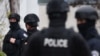 Kosovo's defense minister said that the man arrested was a member of the Kosovar security forces.