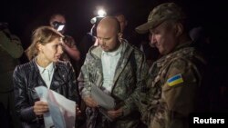 Архівне фото. Процес обміну полоненими недалеко від Донецька (вересень 2014 року)