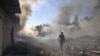 A rescuer walks among debris at the site of a residential area destroyed by a Russian military strike, in the town of Toretsk in Ukraine's Donetsk region on July 27.