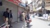 په پېښور کې د هړتال پر مهال د تړل شوي بازار عکس (ارشیف)