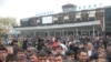 Tajikistan - Tens of passengers waiting to fly to Russia in Dushanbe airport at 29Mar2010