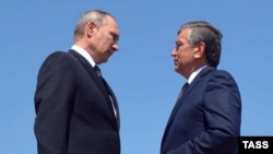 Владимир Путин и Шавкат Мирзиёев на похоронах Ислама Каримова, 6 сентября 2016 года