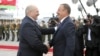 Belarus -- President Alyaksandr Lukashenka (L) welcomes his Azerbaijani counterpart Ilham Aliyev to Minsk, 28Aug2012