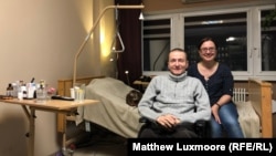 Roman Kolpakov, founder of the Russian Orthodox dating site Parishioners, and his wife, Natalya, at their Moscow apartment