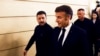 Ukrainian President Volodymyr Zelenskyy and French President Emmanuel Macron leave a joint press conference in Paris on March 26. 