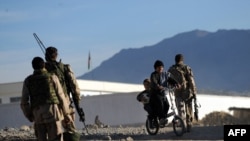 ISAF soldiers, like these Dutch troops in Mirwais, could maintain just a "supporting role" in some places "by early 2011."