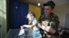 Голосування на одній з виборчих дільниць на Львівщині під час виборів президента України, 25 травня 2014 року 