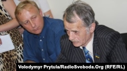 Mustafa Jemilev (right), with his lawyer