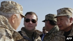 Russian President Dmitry Medvedev with Kazakhstan's Nursultan Nazarbaev, Tajikistan's Emomali Rahmon, and Kyrgyzstan's Kurmanbek Bakiev during exercises of the Shanghai Cooperation Organization -- Eurasia's answer to NATO?