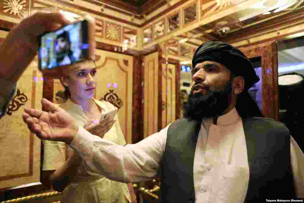 Taliban spokesman Suhail Shaheen after a news conference in Moscow on July 9. The militant Islamist group says it controls some 85 percent of Afghanistan -- a claim that is difficult to confirm. 