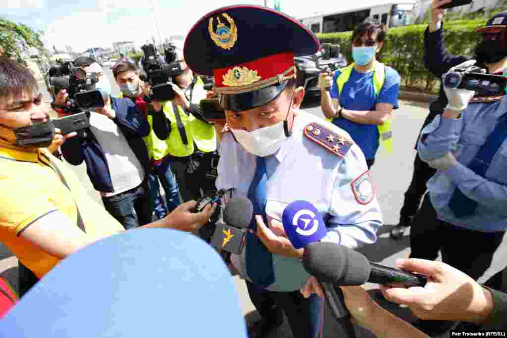 The deputy chief of the Nur-Sultan police arrives at the site of the planned protest rally.